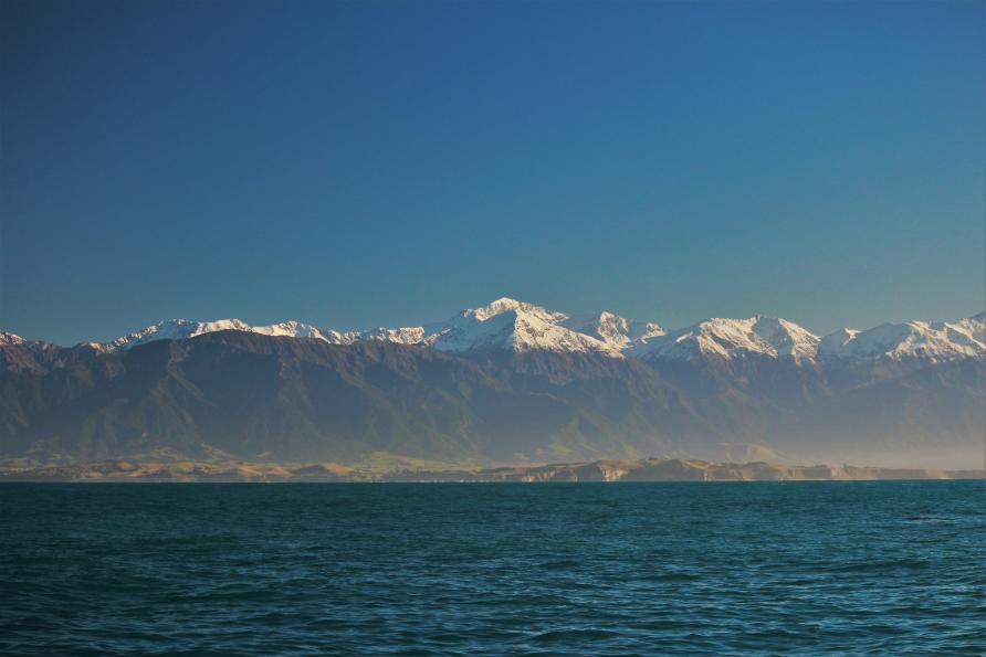 Kaikōura ranges covered in snow against a crisp blue sky